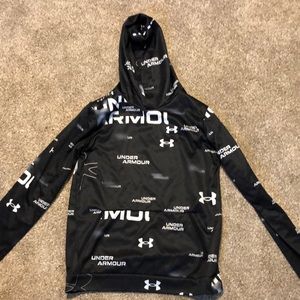 A black and white under armor YOUTH EXTRA LARGE